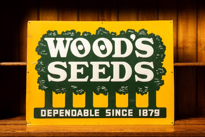 Woods Seeds Embossed Tin Sign