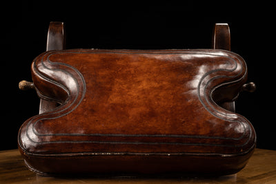 Vintage Peruvian leather saddle stool