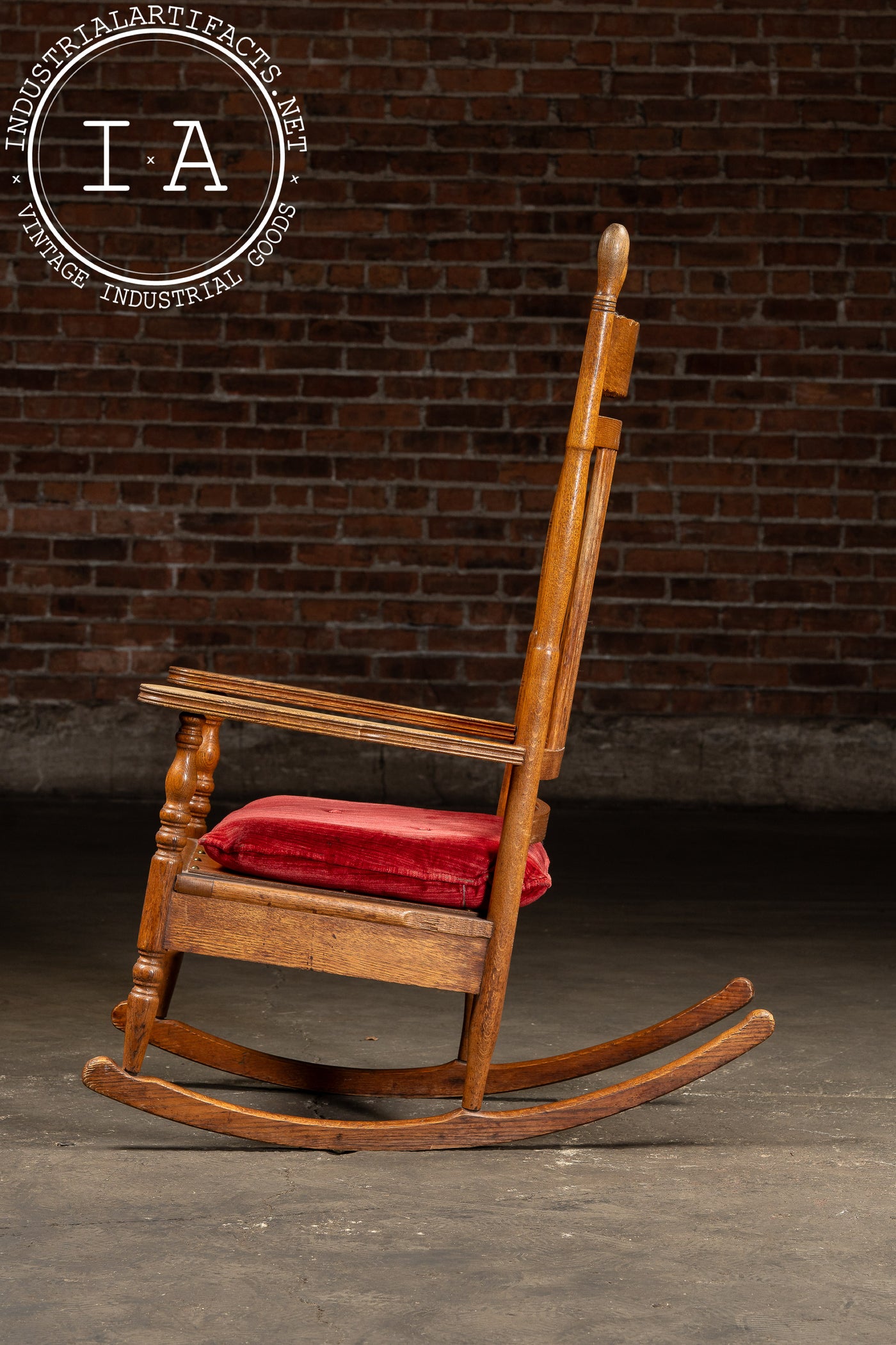 Antique Wooden Rocking Chair With Red Cushion