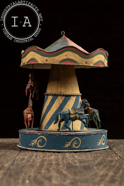 Antique Painted Tin Folk Art Carousel Toy