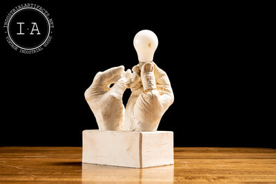 Contemporary Hands and Light Bulb Sculpture