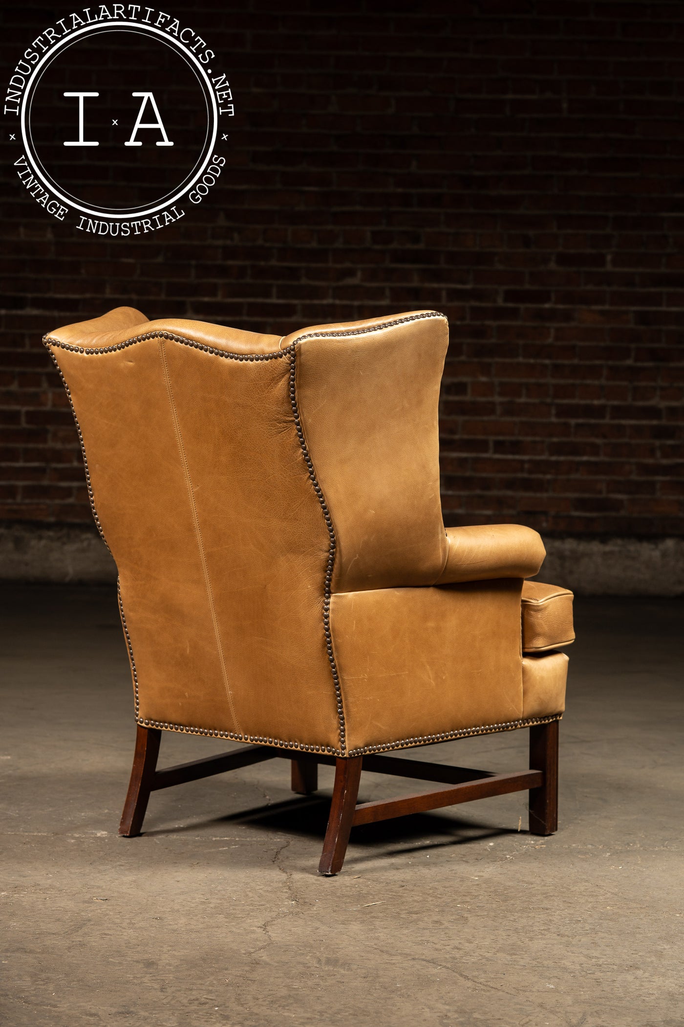 Vintage Leather Wingback Armchair With Ottoman in Tan