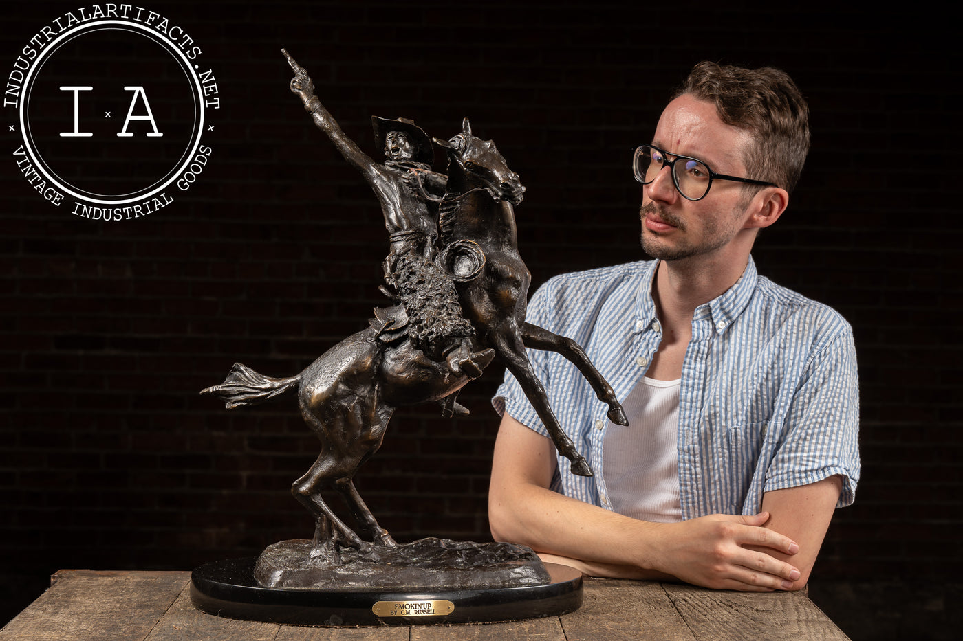 Smokin' Up | 1903 C. M. Russel Bronze Statue on Plaque, Signed and Dated