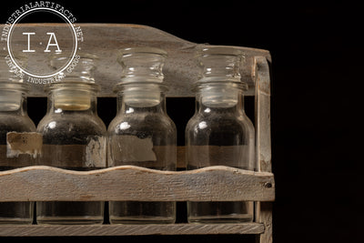 Early Apothecary Bottle Rack with Twelve Glass Stoppered Vials