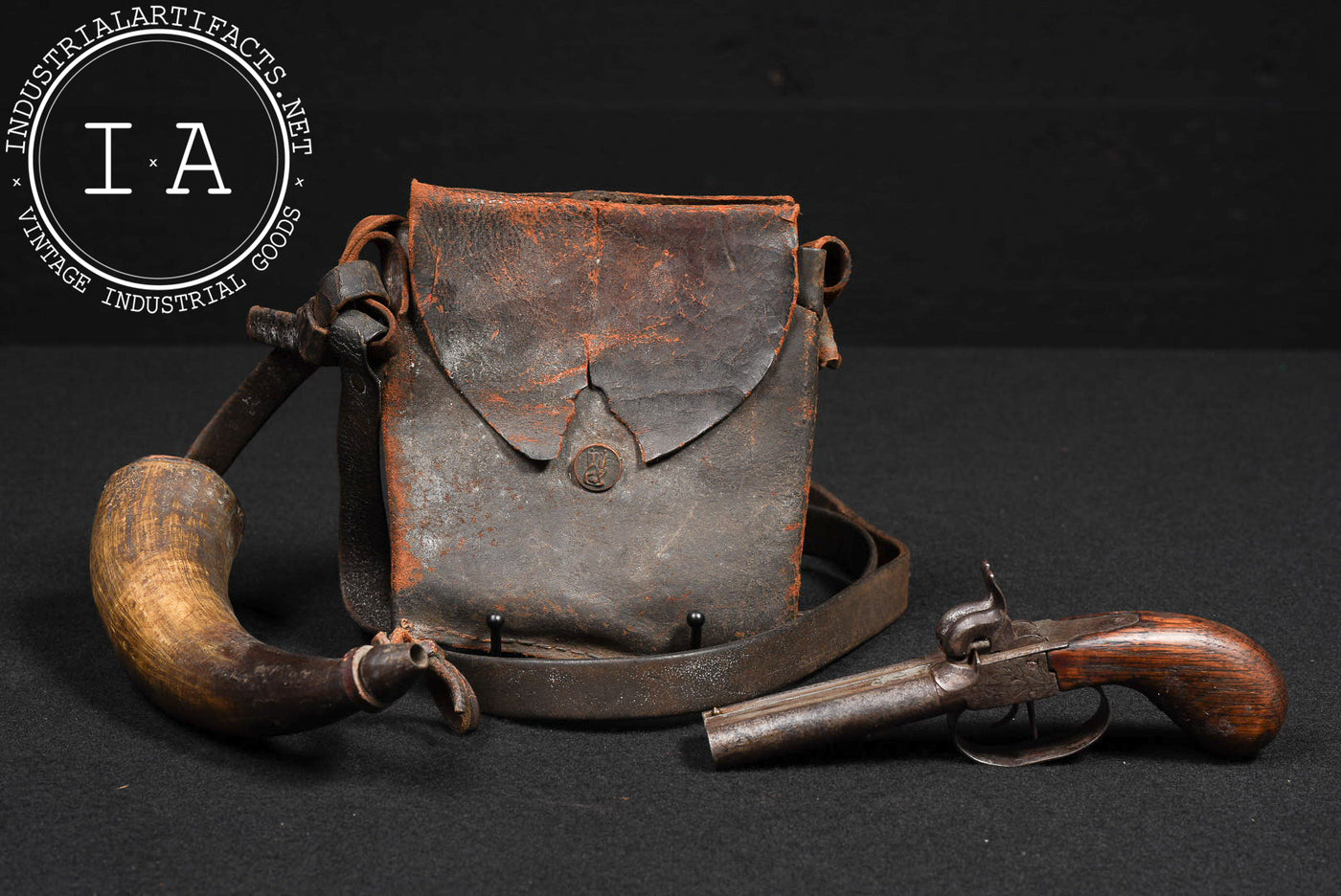 Civil War-Era Flintlock Pistol with Powder Horn and Leather Cartridge Pouch