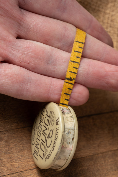 Antique Montgomery Lounge Self-Retracting Advertising Tape Measurer