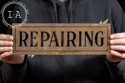 Antique “Repairing” Debossed Brass Sign