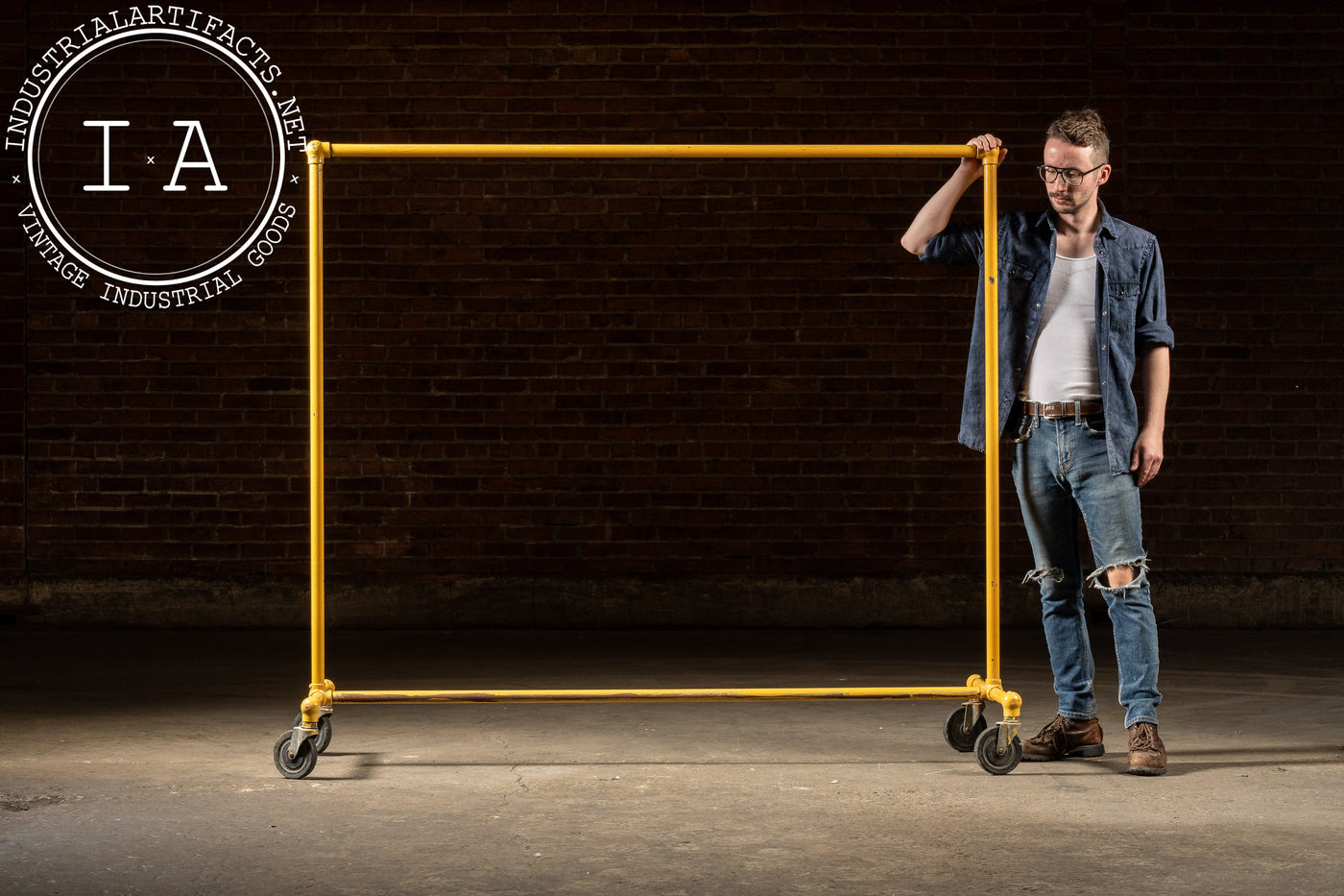 Vintage Industrial Pipe Rolling Garment Rack in Yellow