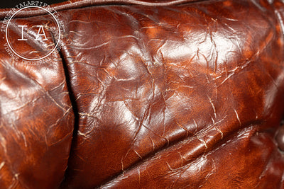 Vintage Tufted Leather Chesterfield Armchair and Ottoman by Hickory Chair
