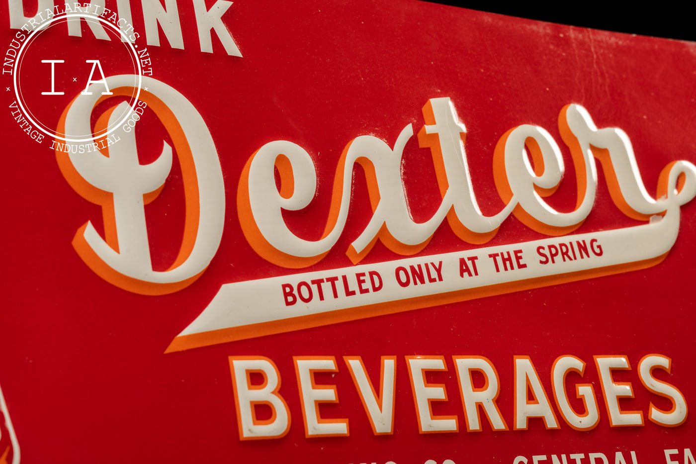 Vintage Dexter Beverages Embossed Tin Sign