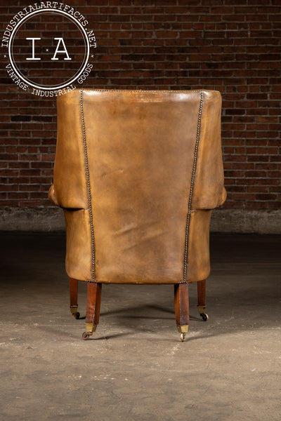 Mid-Century Leather High-Wingback Rolling Armchair In Brown