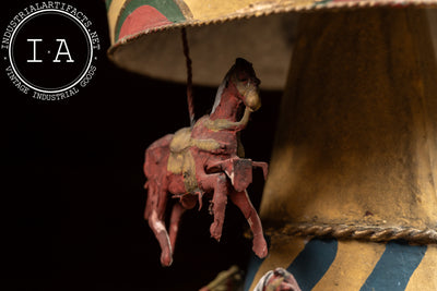 Antique Painted Tin Folk Art Carousel Toy