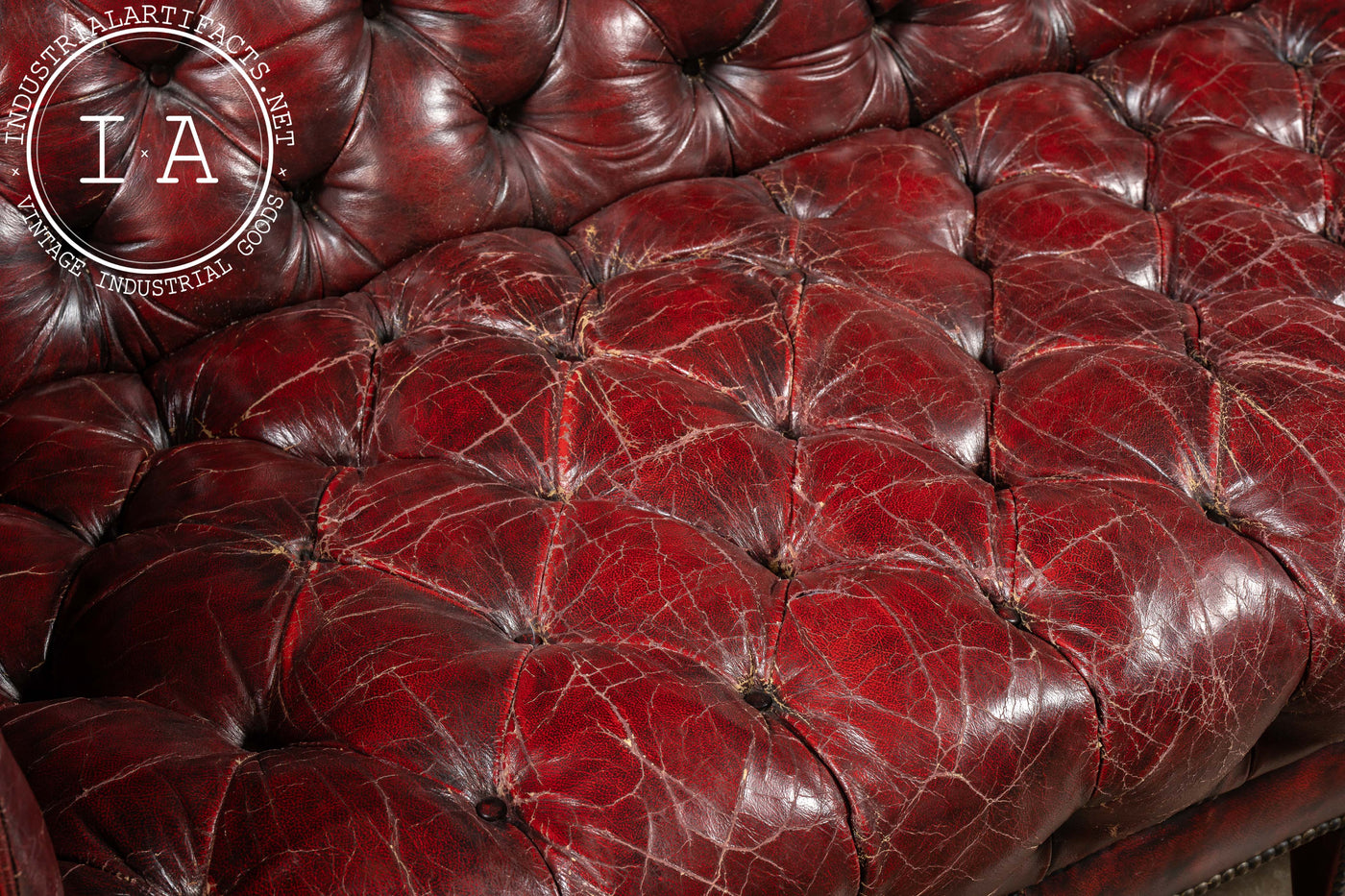 Antique Rolling Tufted Oxblood Sofa