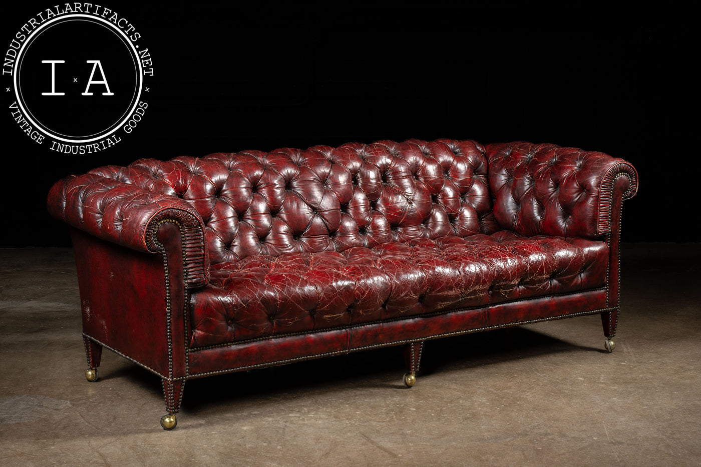 Antique Rolling Tufted Oxblood Sofa