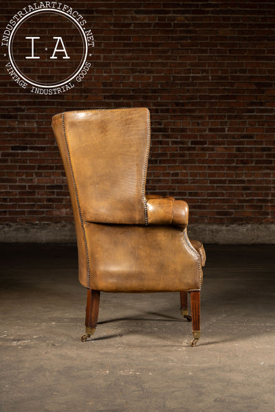 Mid-Century Leather High-Wingback Rolling Armchair In Brown