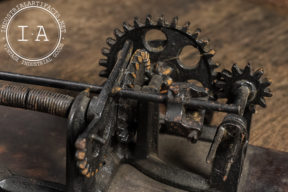 Primitive Cast Iron Apple Peeler on Wood Base