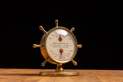 1930s Brass Sailing Wheel Advertising Thermometer