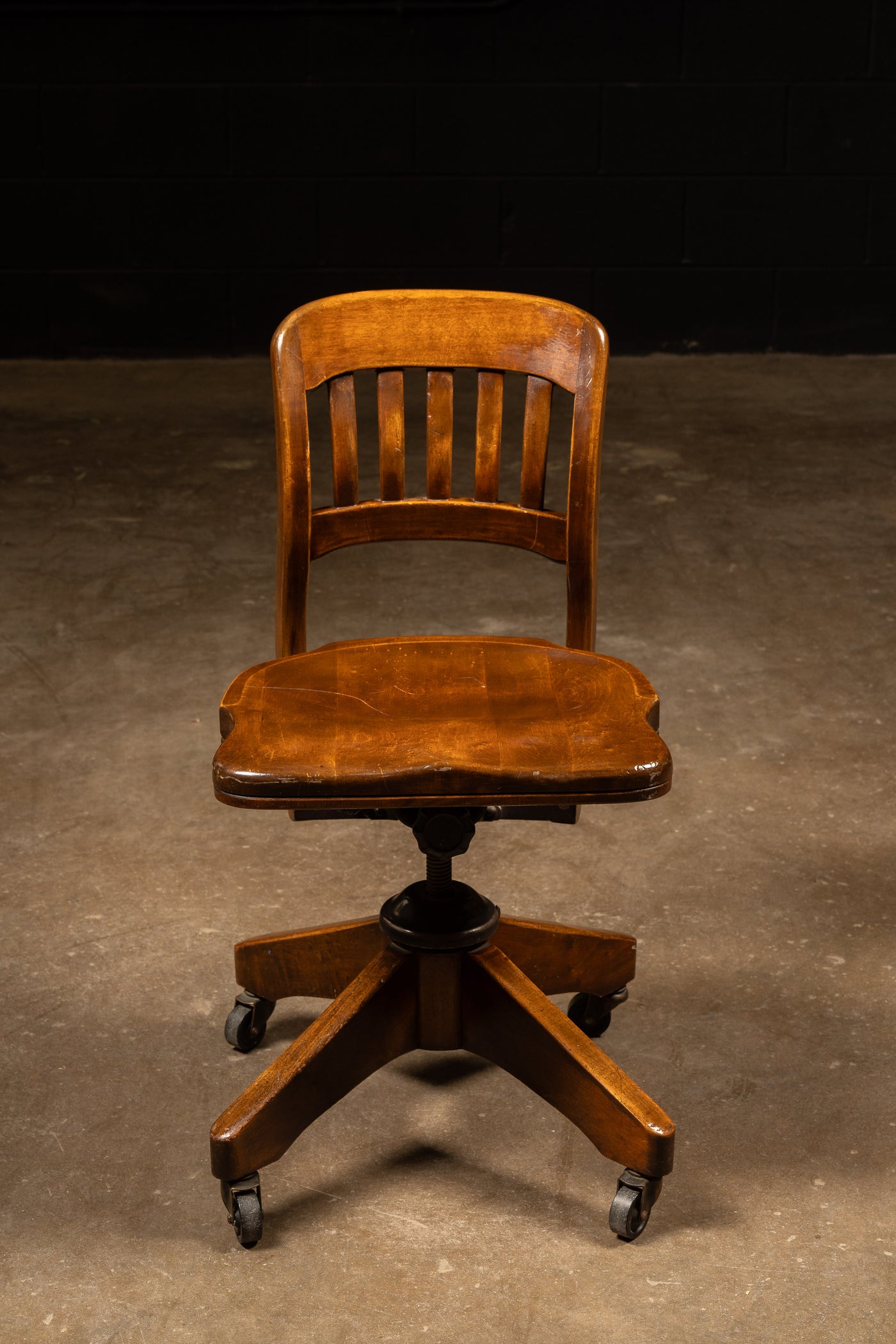 Antique Wooden Rolling Banker's Chair