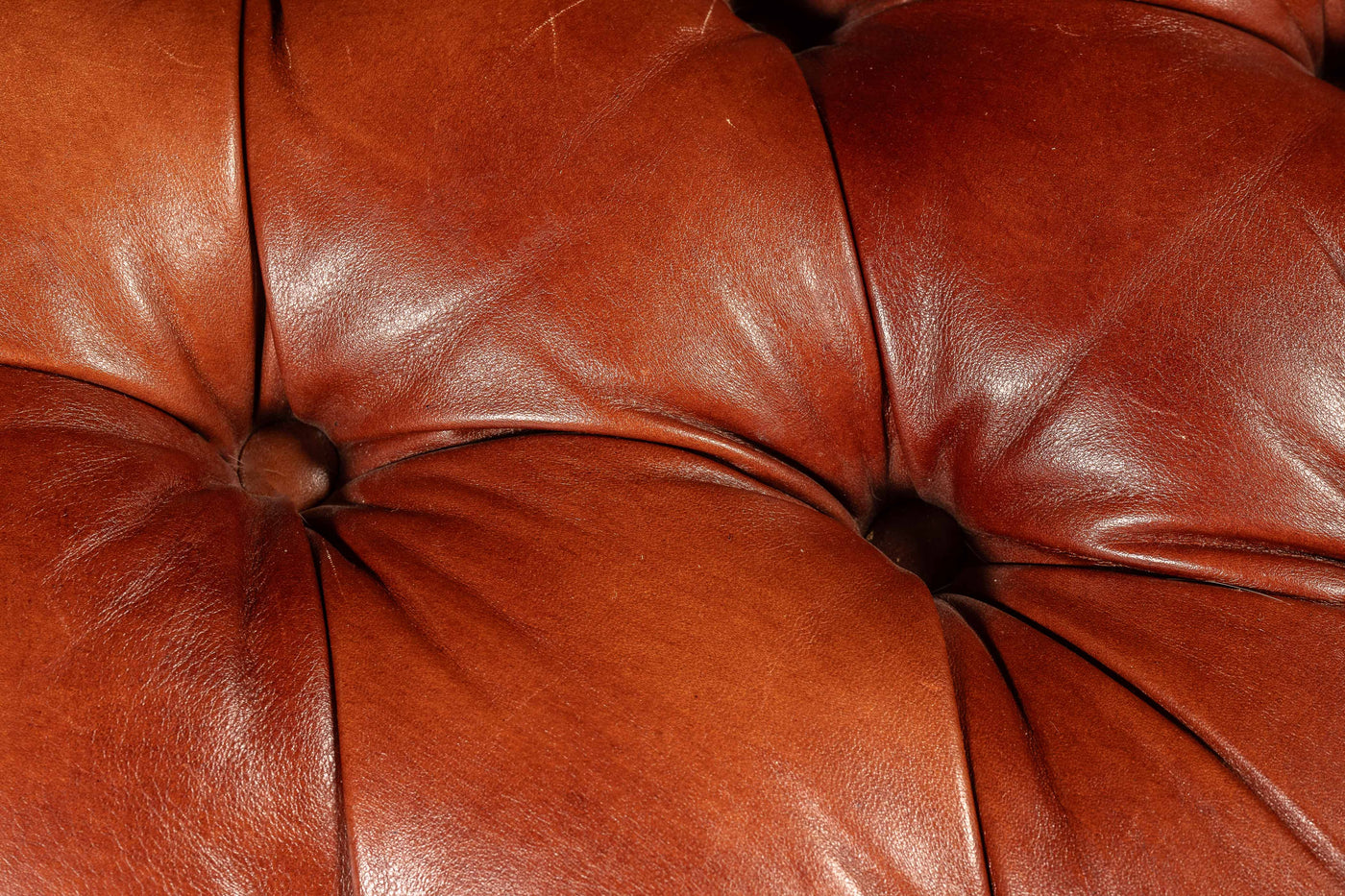 Tufted Wheeled Ottoman in Rust