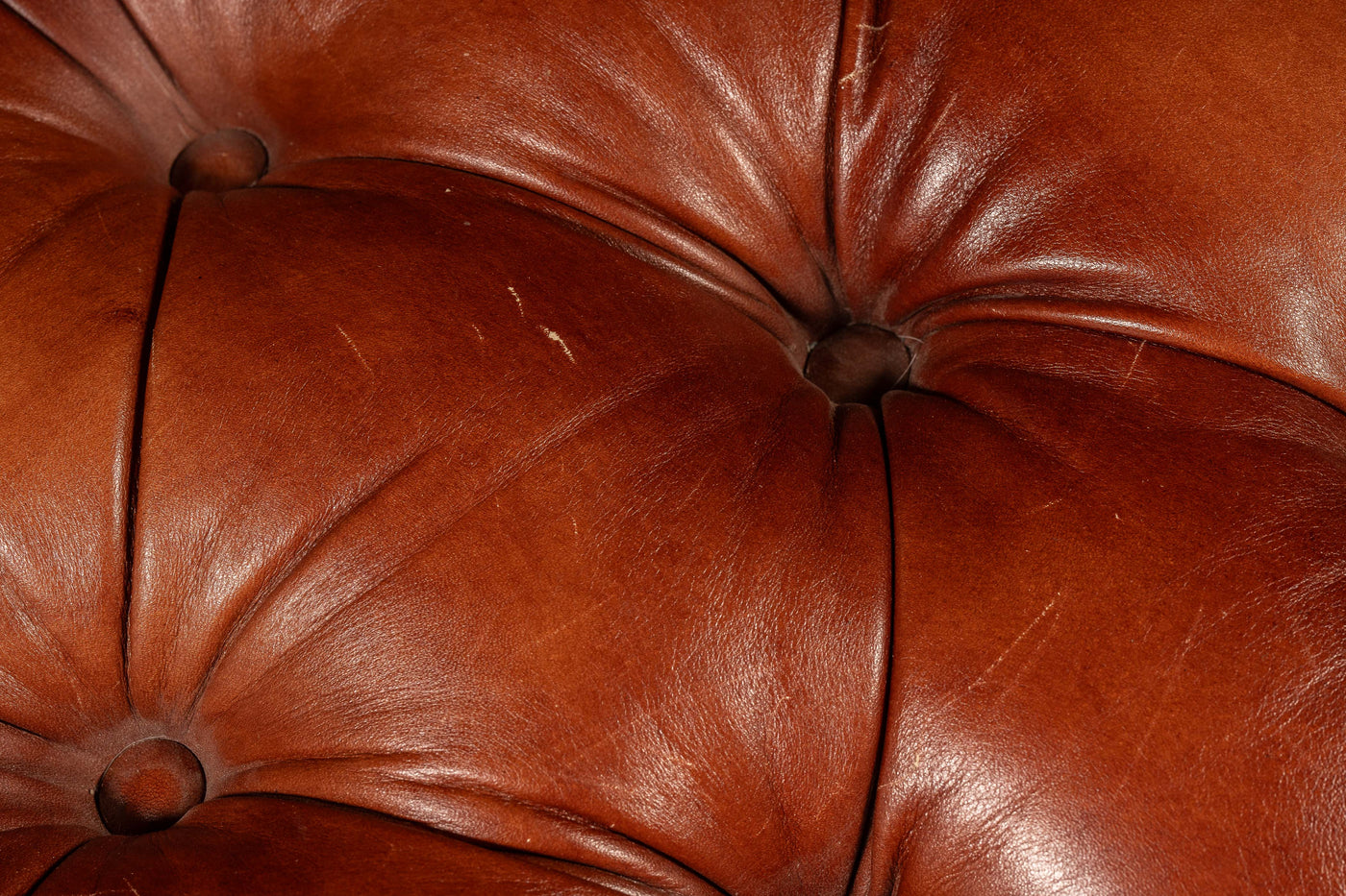 Tufted Wheeled Ottoman in Rust