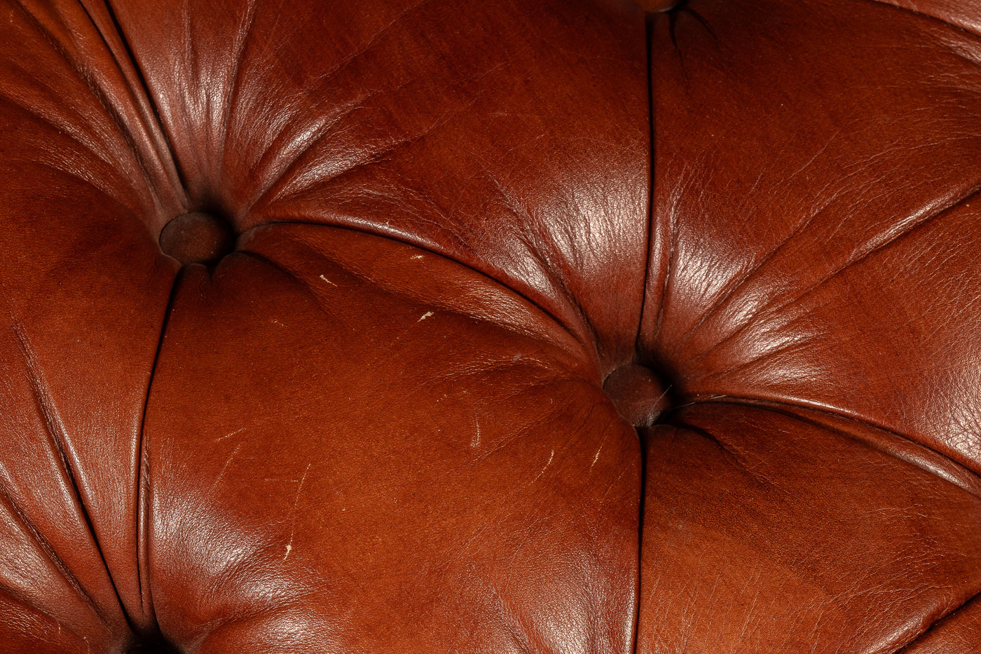 Tufted Wheeled Ottoman in Rust