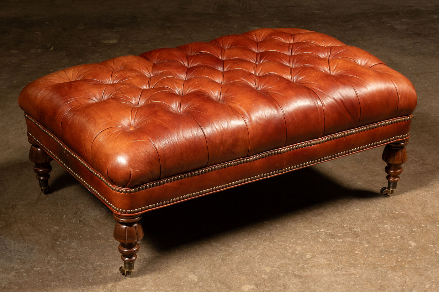 Tufted Wheeled Ottoman in Rust