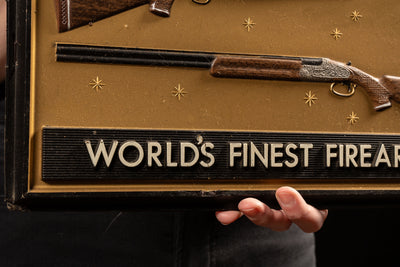 Vintage Weatherby Firearms Embossed Plastic Sign
