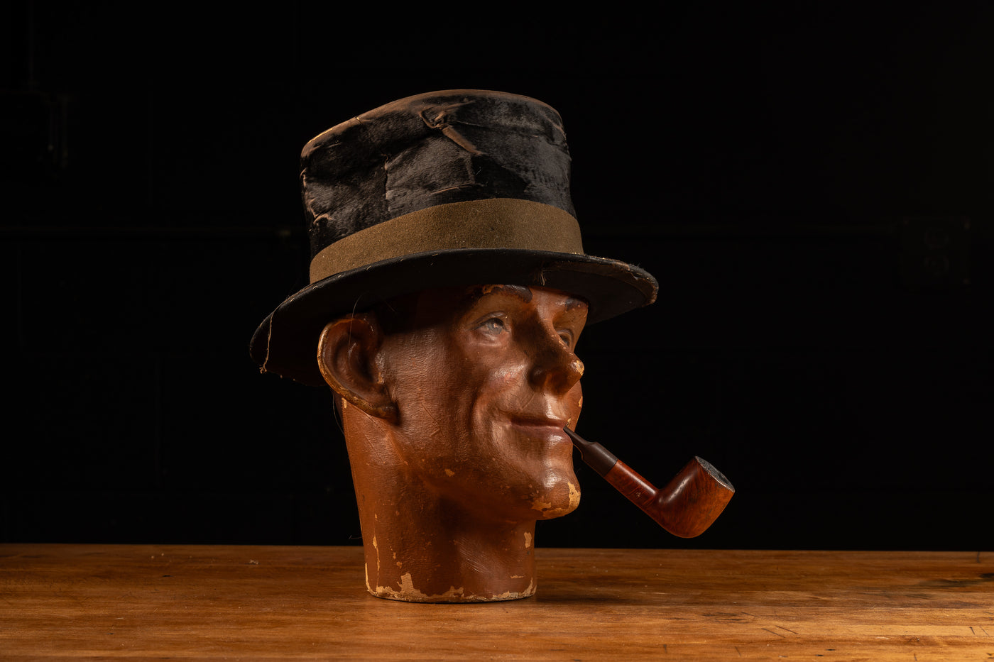 Bust with Stovepipe Hat and Pipe