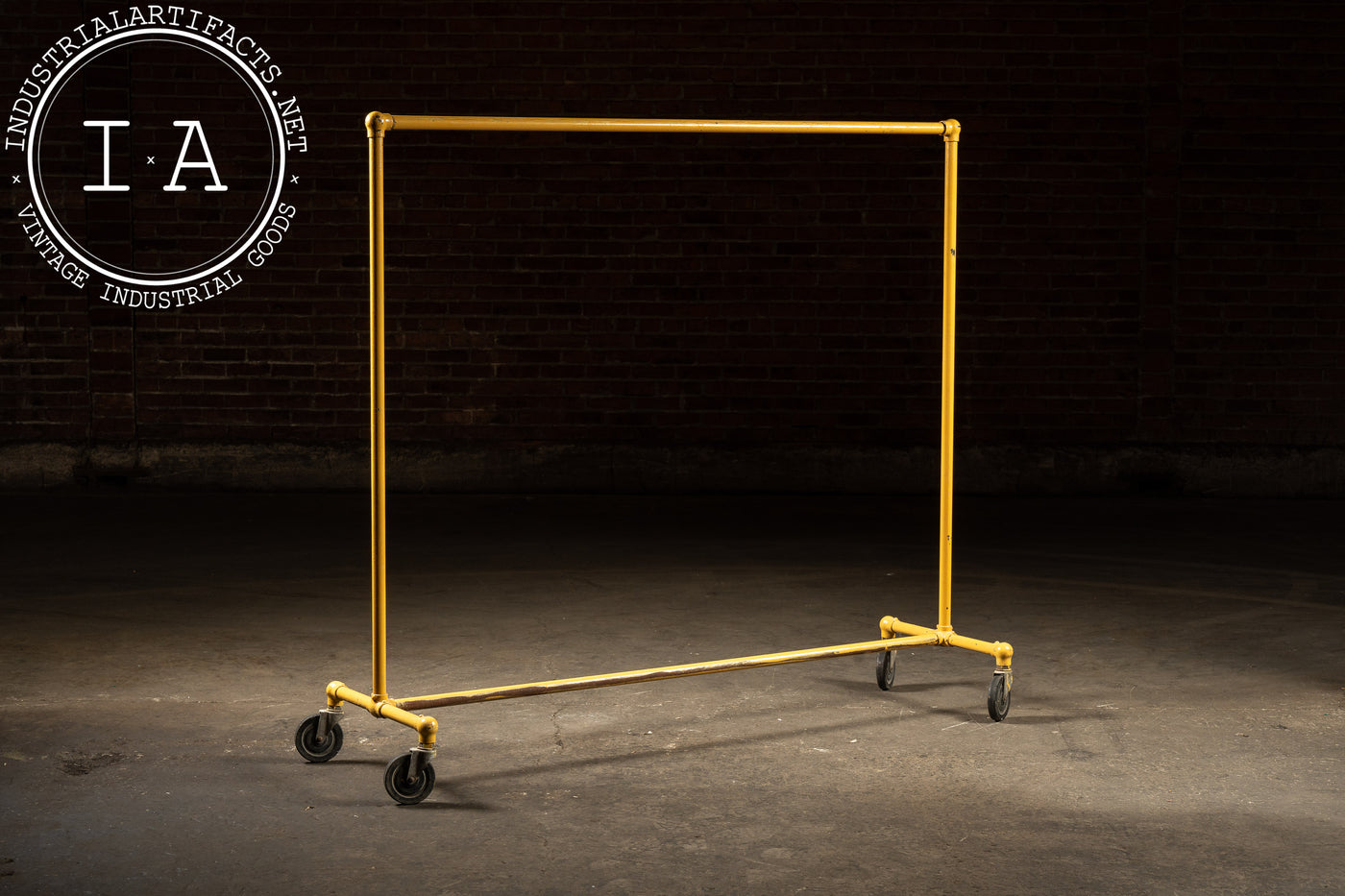 Vintage Industrial Pipe Rolling Garment Rack in Yellow