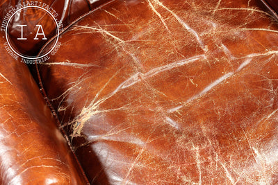 Vintage Tufted Leather Chesterfield Armchair and Ottoman by Hickory Chair