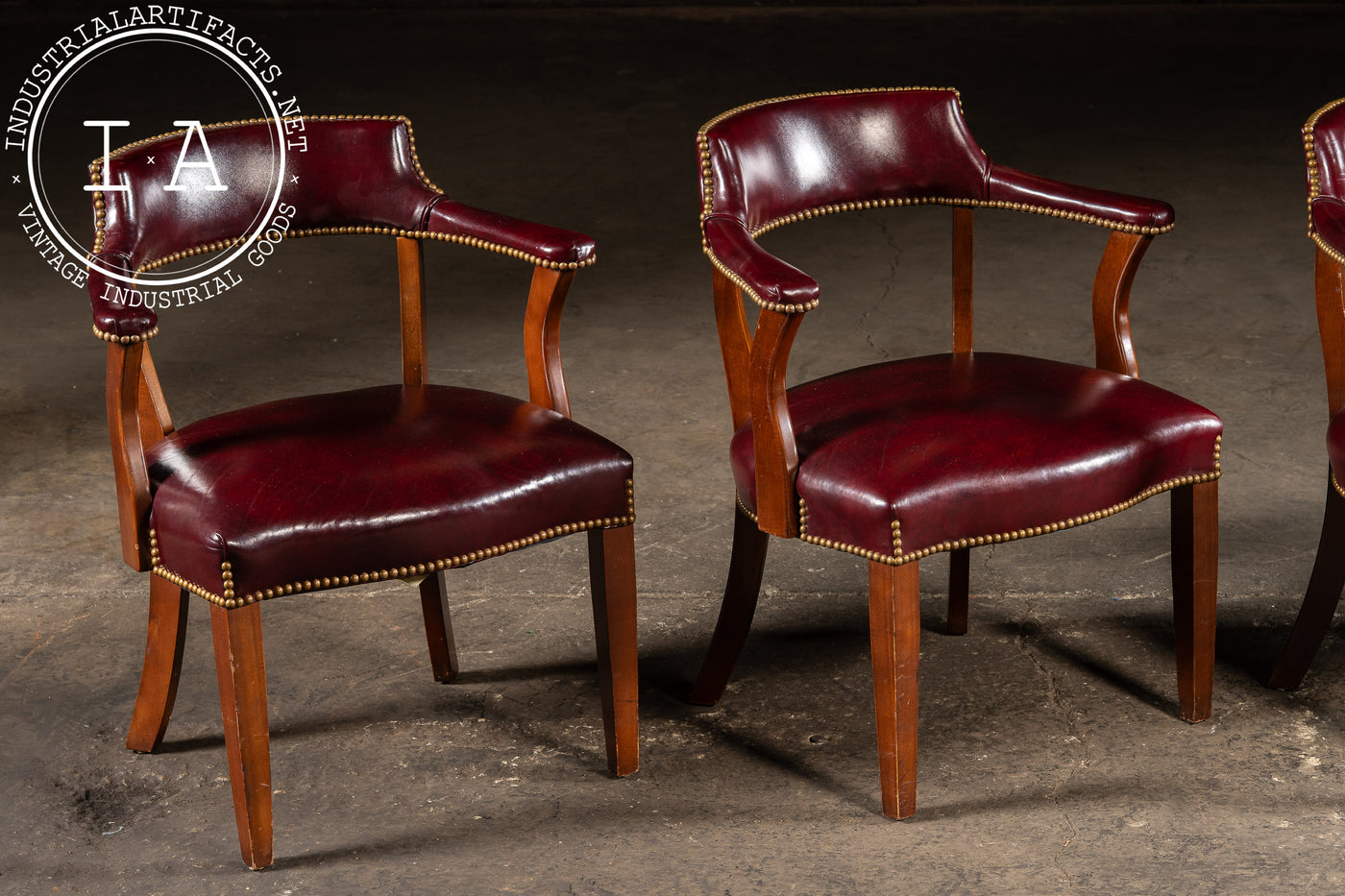 Set Of Four Nailhead Trim Barrel-Back Leather Armchairs in Oxblood