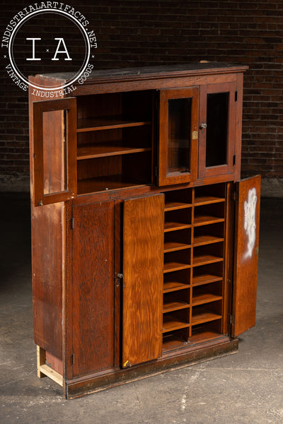 Antique Massive Oak Cabinet with Glass Doors and Interior Cubbies