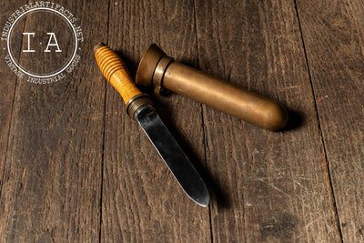 WWII-Era Serrated Survival Knife with Defensive Sheath