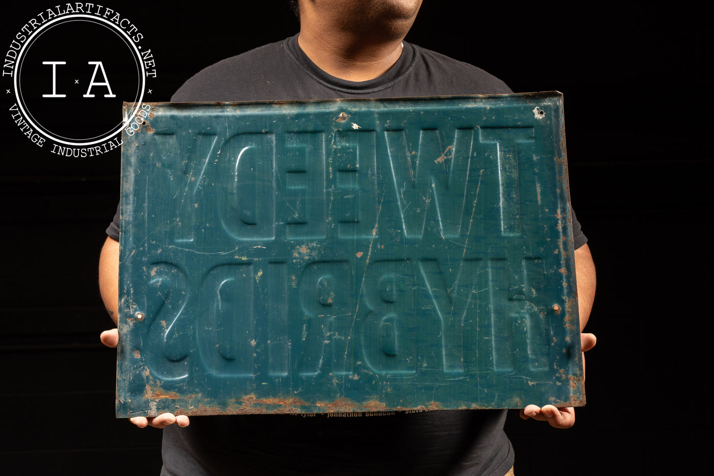 Vintage Reflective Tweedy Hybrids Embossed Tin Sign