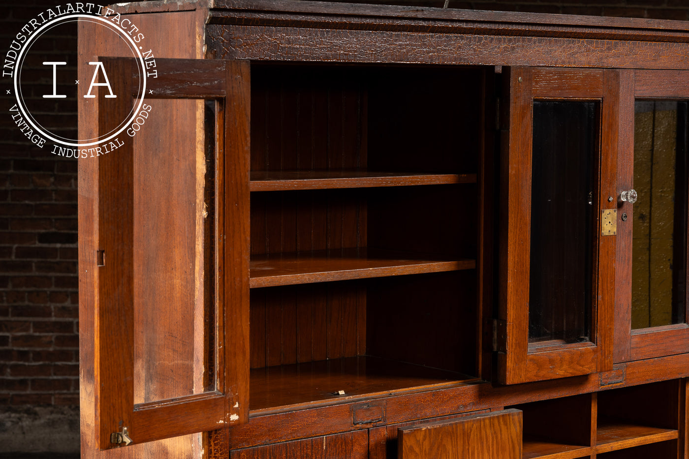 Antique Massive Oak Cabinet with Glass Doors and Interior Cubbies
