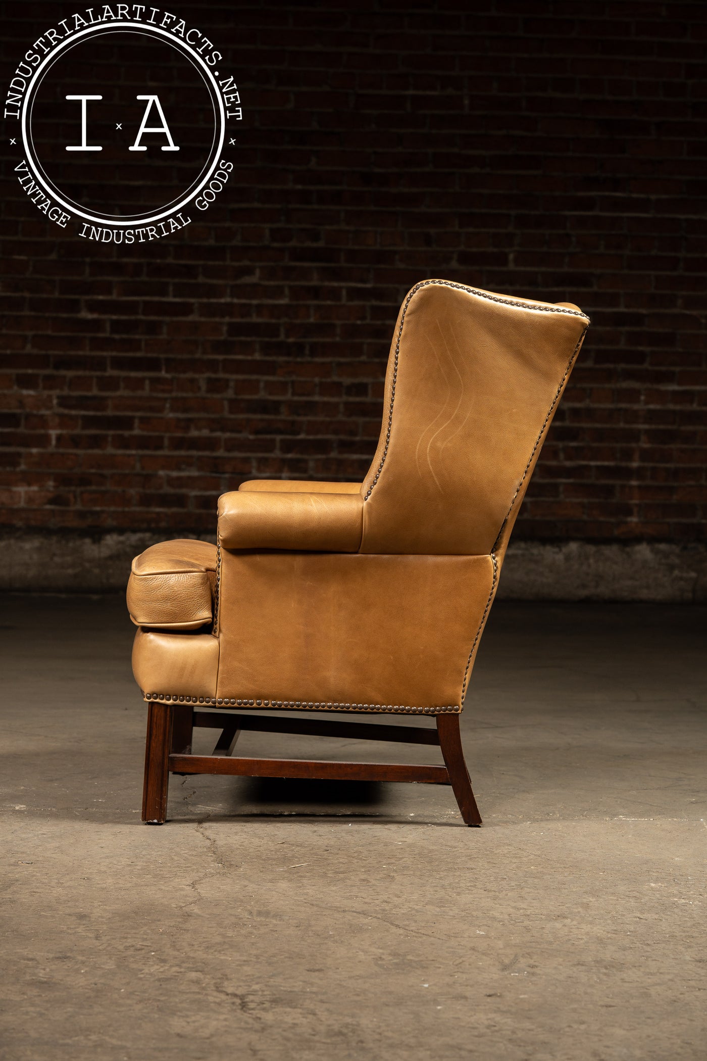 Vintage Leather Wingback Armchair With Ottoman in Tan