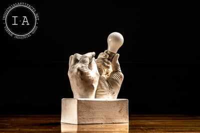 Contemporary Hands and Light Bulb Sculpture