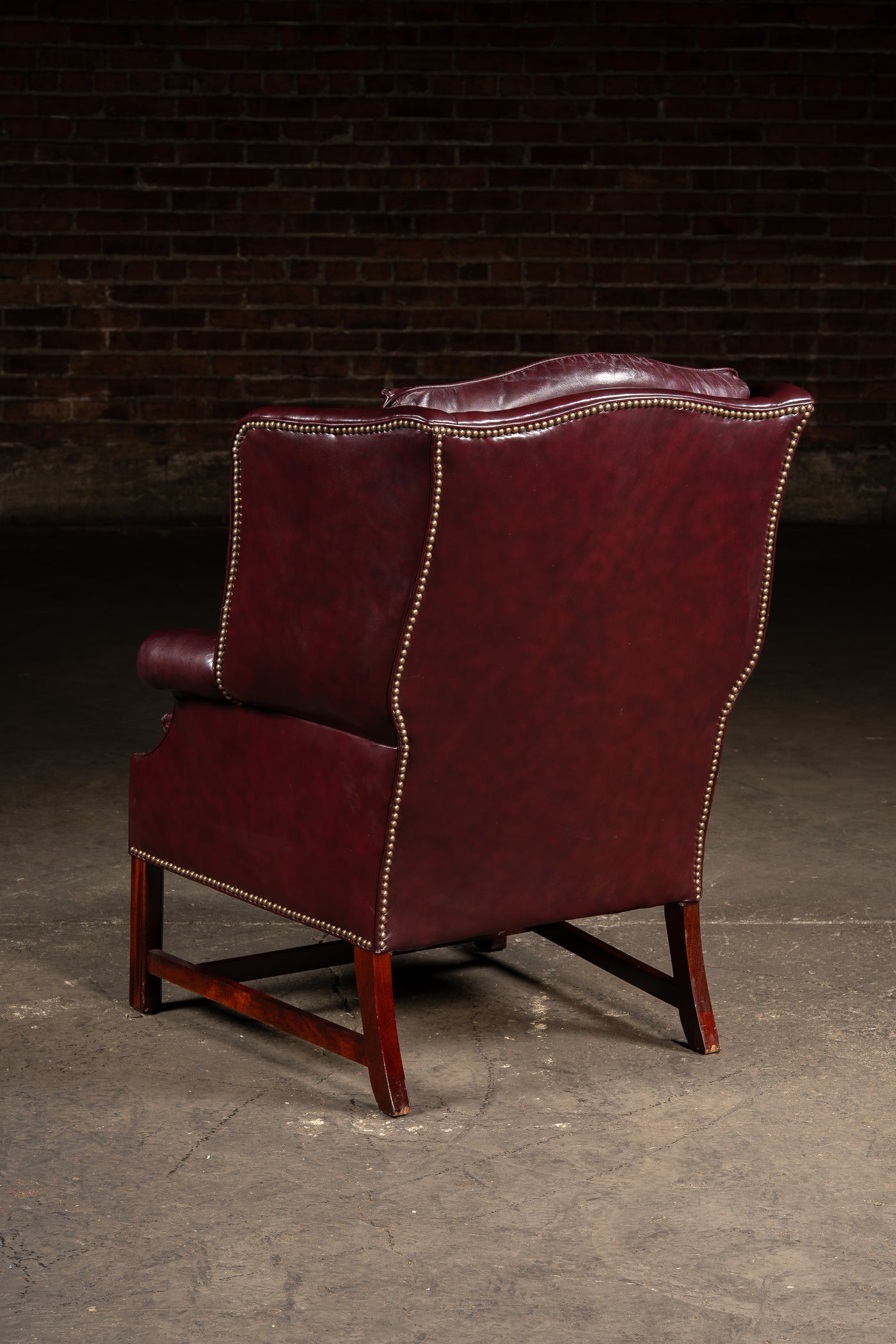 Tufted Leather Wingback Chesterfield Armchair with Ottoman in Oxblood