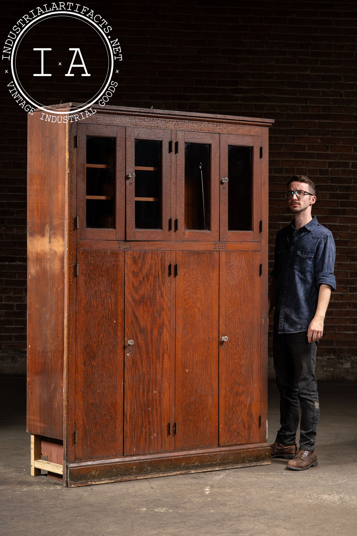 Antique Massive Oak Cabinet with Glass Doors and Interior Cubbies
