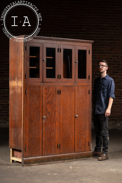 Antique Massive Oak Cabinet with Glass Doors and Interior Cubbies
