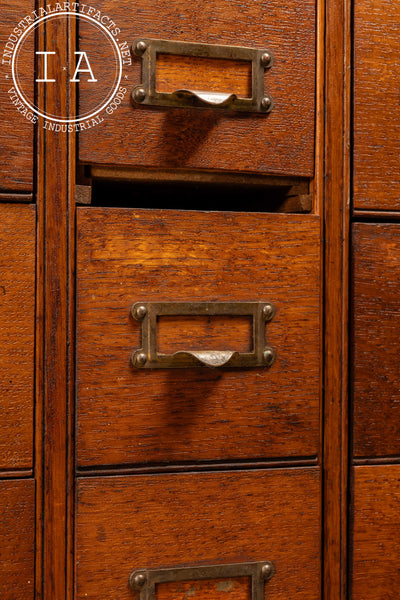 Massive 168-Drawer Oak Parts Cabinet