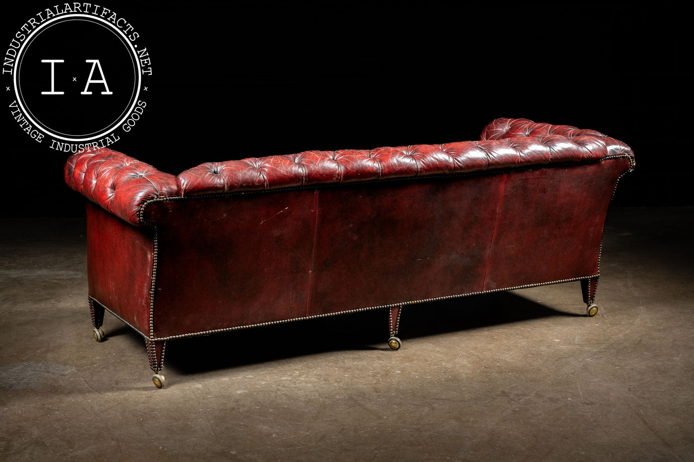 Antique Rolling Tufted Oxblood Sofa