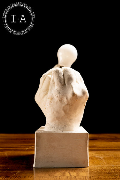 Contemporary Hands and Light Bulb Sculpture
