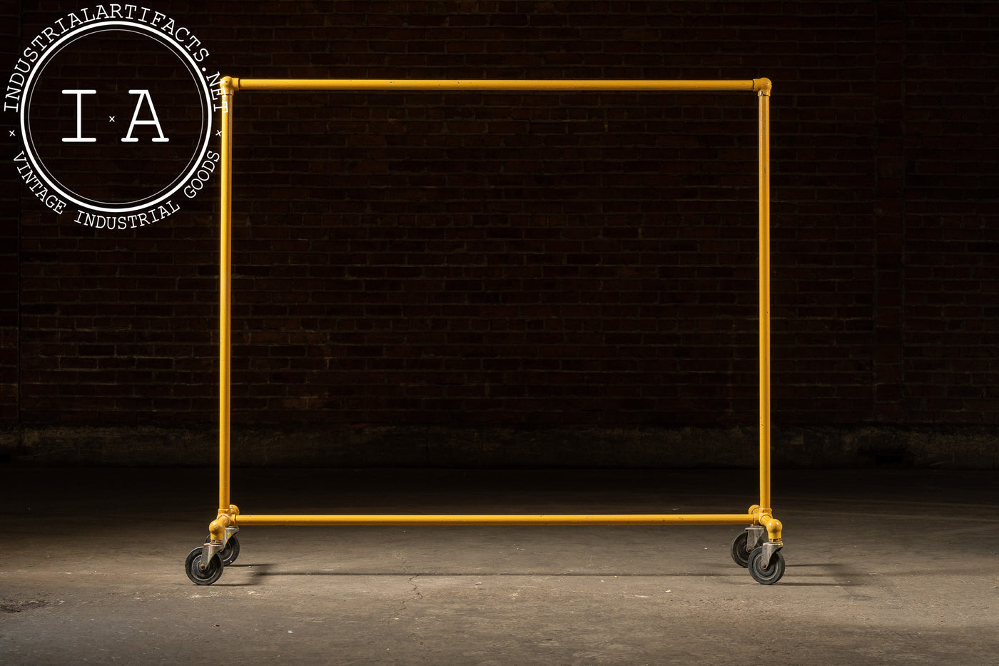 Vintage Industrial Pipe Rolling Garment Rack in Yellow