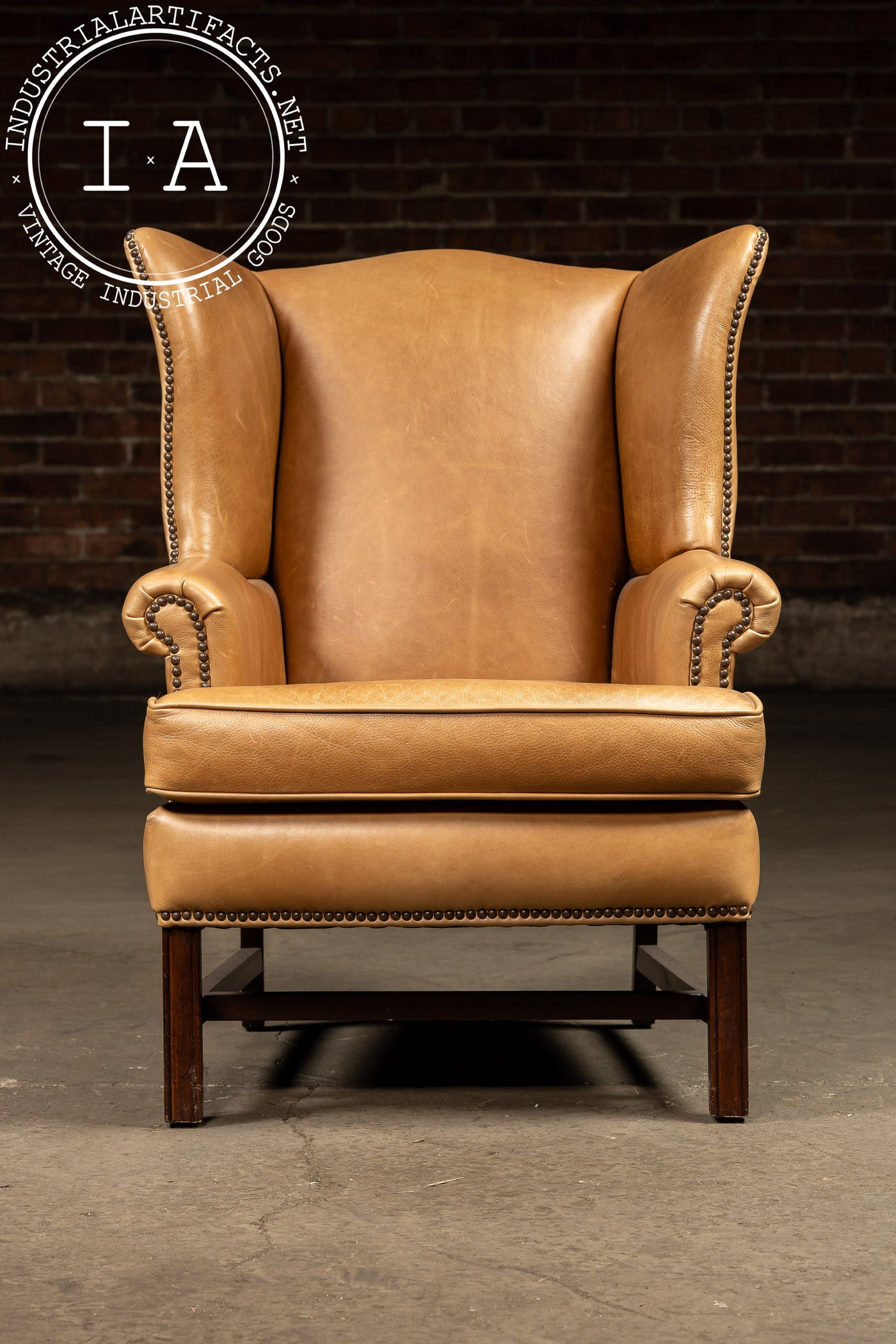 Vintage Leather Wingback Armchair With Ottoman in Tan