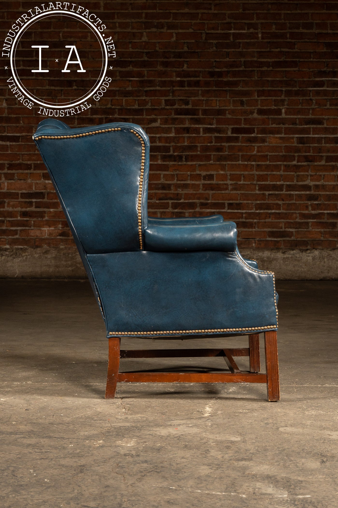 Vintage Tufted Leather Chesterfield Wingback Armchair in Blue