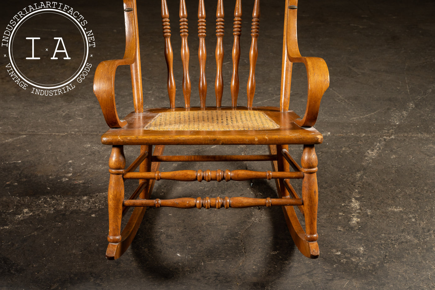 Antique Victorian Press-Back Oak Rocking Chair with Cane Seat