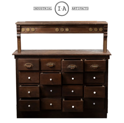 C. 1920 Wooden Apothecary Cabinet With Ornate Cast Iron Drawer Pulls