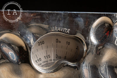 Postmodern Liquid Metallic Foot Scale by Gravita