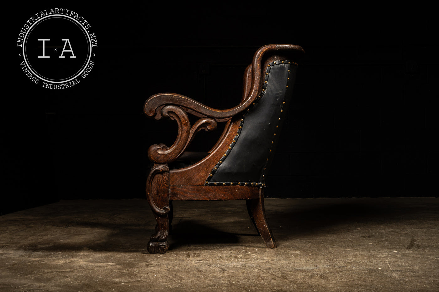 Antique Tufted Leather Clawfoot Armchair